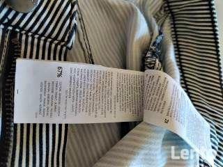 Spodnie w biało- czarne paseczki:) nowe