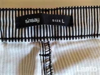 Spodnie w biało- czarne paseczki:) nowe