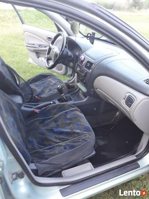 Nissan-1.8-gaz-jeździ, skręca, hamuje-na częsci