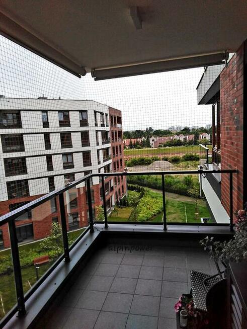 Montaż siatki dla kota na balkon preciw ptakóm na gołębie