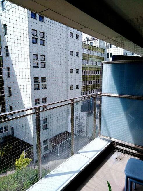 Montaż siatki dla kota na balkon preciw ptakóm na gołębie