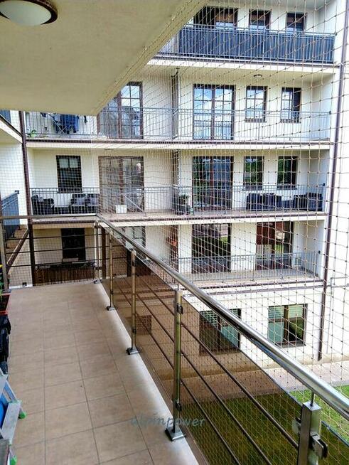 Montaż siatki dla kota na balkon preciw ptakóm na gołębie