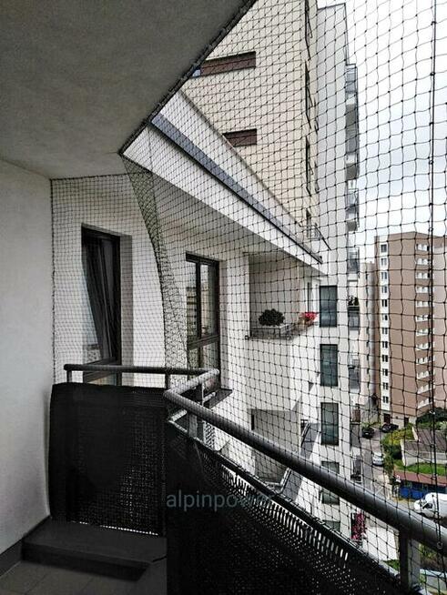 Montaż siatki dla kota na balkon preciw ptakóm na gołębie