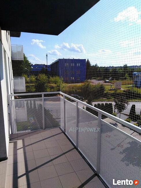 Montaż siatki na gołębie preciw ptakóm osiatkowanie balkonu