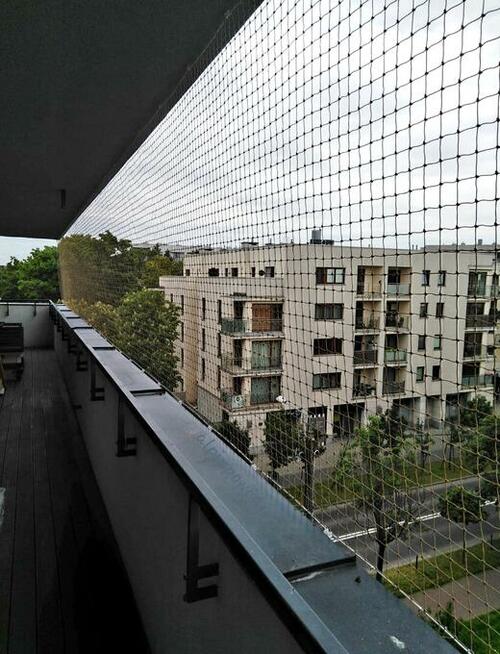 Montaż siatki dla kota na balkon preciw ptakóm na gołębie