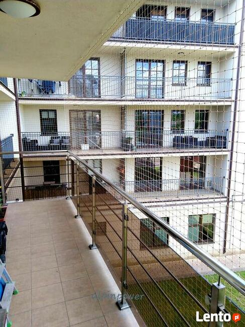 Montaż siatki na balkon dla kota przeciw ptakóm na gołębie
