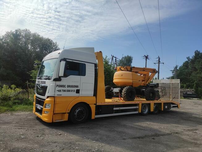 Usługi transportowe Laweta Transport maszyn M-Trajectory