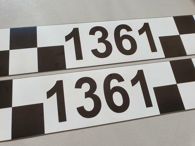 oznaczenia taxi Kraków cenniki herby magnesy numery boczne