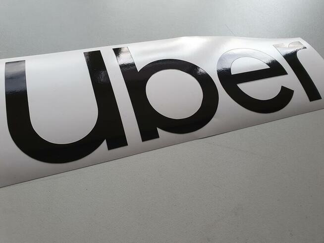 oznaczenia taxi Kraków cenniki herby magnesy numery boczne