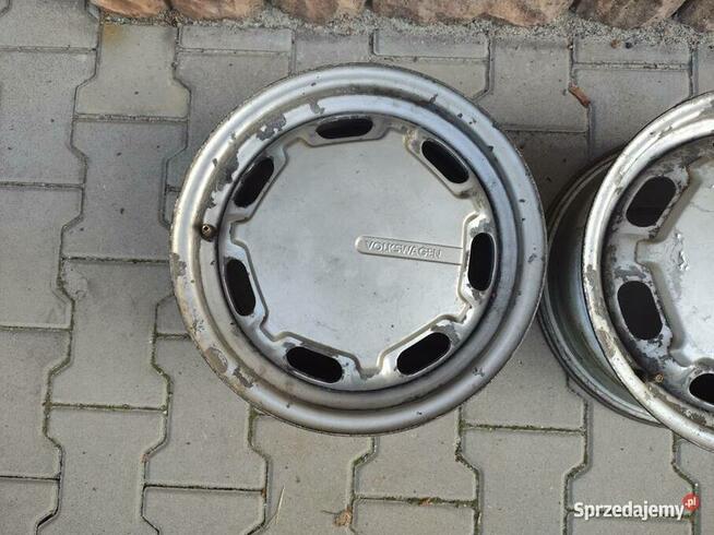Felgi VW 14 z kołpakami OEM Passat 357601025A/B