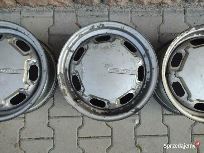 Felgi VW 14 z kołpakami OEM Passat 357601025A/B