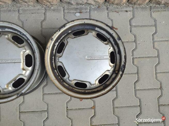Felgi VW 14 z kołpakami OEM Passat 357601025A/B