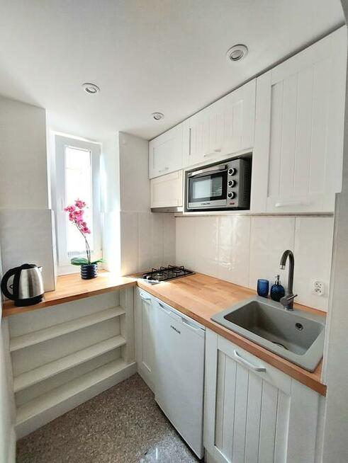 Kamienica Ząbkowska 37 - Koneser studio z antresolą w pełni