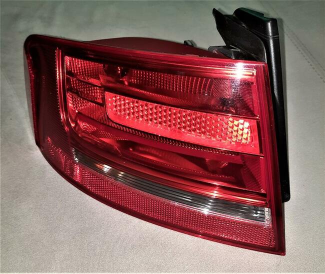 Oryginalna lampa - lewy tył Audi A4 B8 (Sedan)