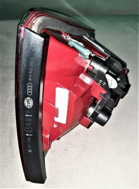 Oryginalna lampa - lewy tył Audi A4 B8 (Sedan)