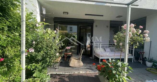 Nowoczesne mieszkanie z ogródkiem i garażem