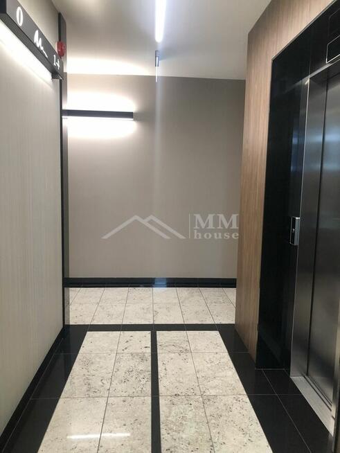 Nowoczesne mieszkanie z ogródkiem i garażem