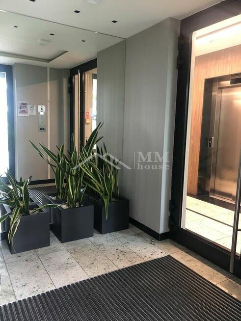 Nowoczesne mieszkanie z ogródkiem i garażem