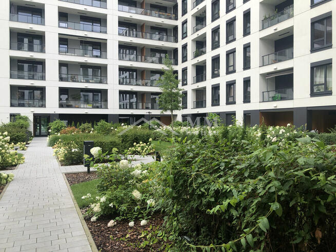 Nowoczesne mieszkanie z ogródkiem i garażem