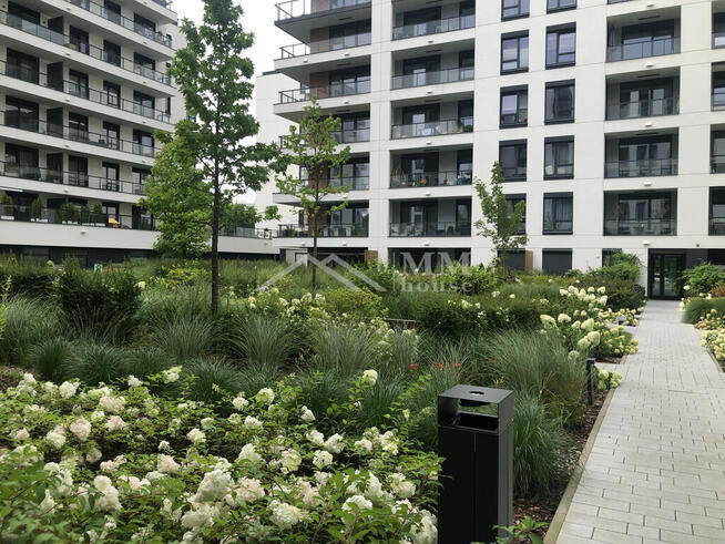 Nowoczesne mieszkanie z ogródkiem i garażem