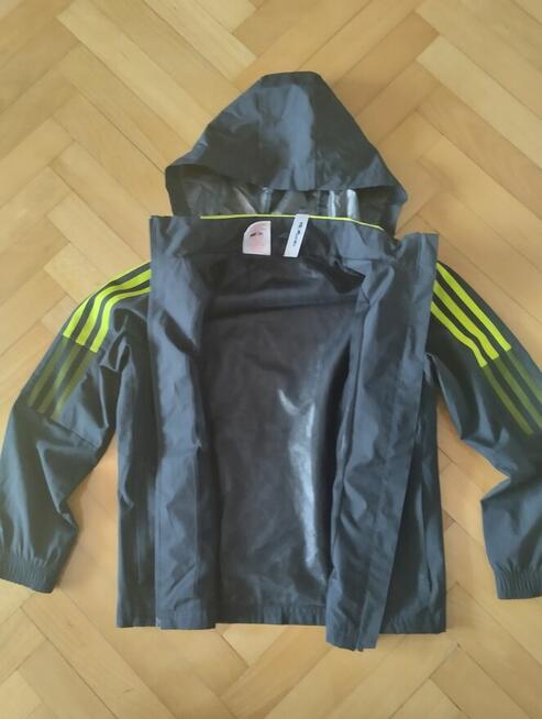 Sprzedam kurtkę wiatrówkę Adidas z kapturem Leeds United