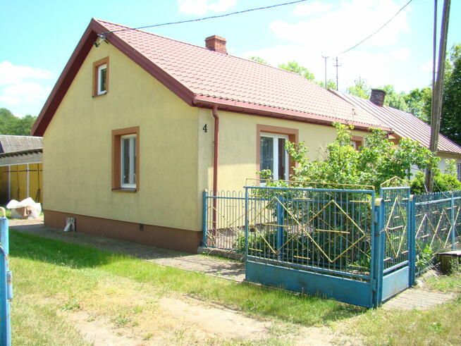 Sprzedam dom z zabudowaniami.