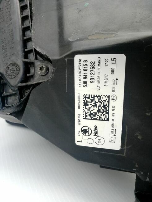 Reflektor Skoda Rapid lewy przód