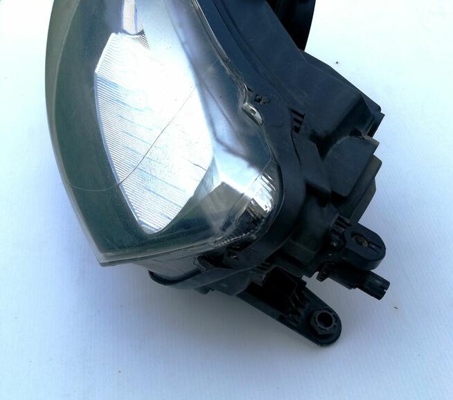 Reflektor Skoda Rapid lewy przód