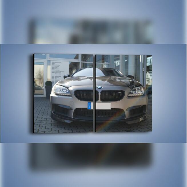 FotoObraz motoryzacyjny VW Golf w warsztacie