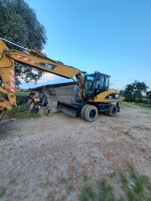 Usługi koparką kołowa CAT M315c