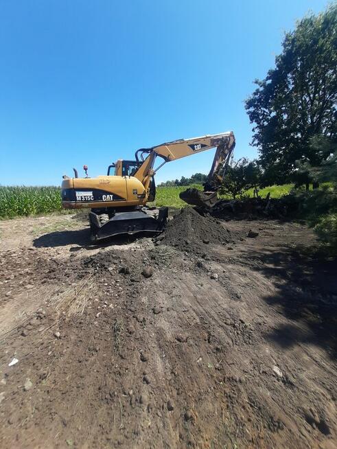 Usługi koparką kołowa CAT M315c