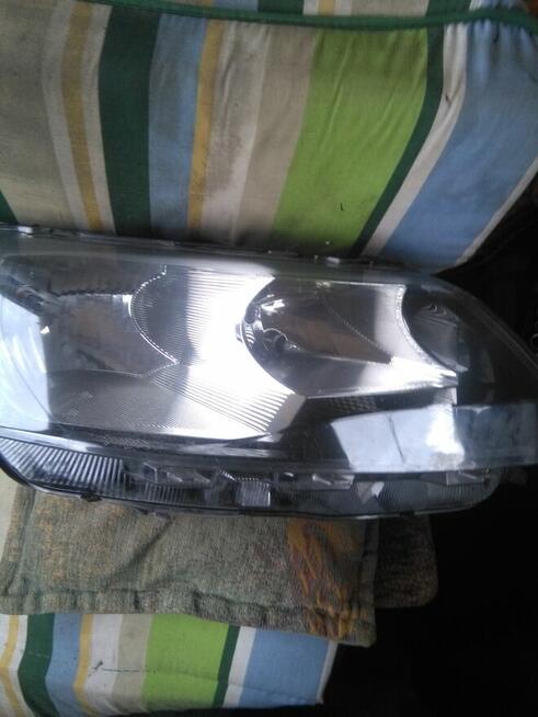 Reflektory przednie lewy+prawy