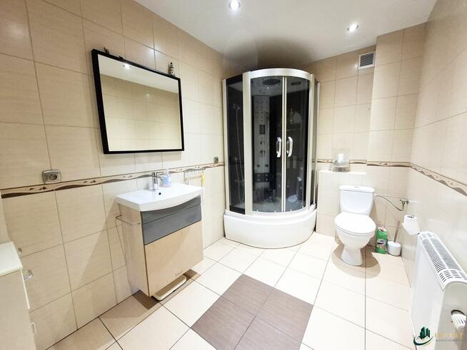 DUŻY DOM W ZABUDOWIE SZEREGOWEJ Z LOKALEM USŁUGOWYM