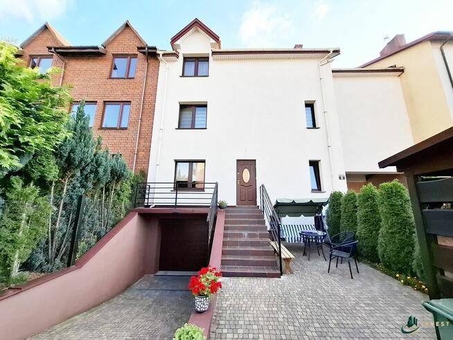 DUŻY DOM W ZABUDOWIE SZEREGOWEJ Z LOKALEM USŁUGOWYM