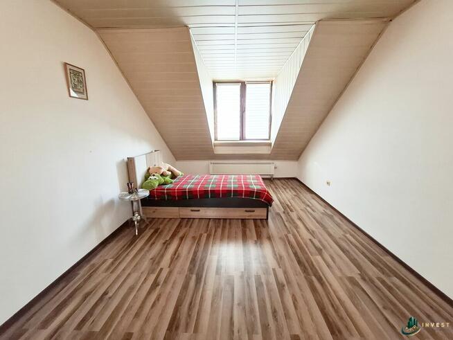 DUŻY DOM W ZABUDOWIE SZEREGOWEJ Z LOKALEM USŁUGOWYM