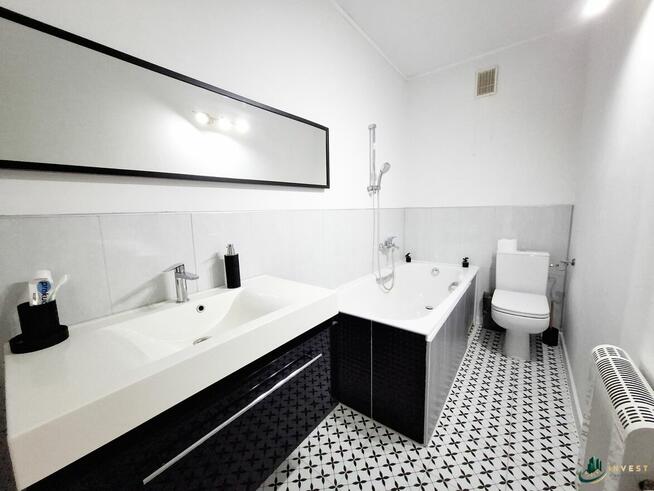 DUŻY DOM W ZABUDOWIE SZEREGOWEJ Z LOKALEM USŁUGOWYM