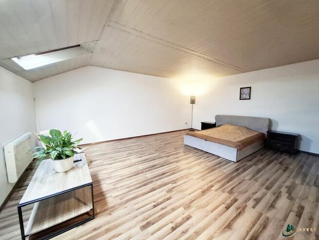 DUŻY DOM W ZABUDOWIE SZEREGOWEJ Z LOKALEM USŁUGOWYM