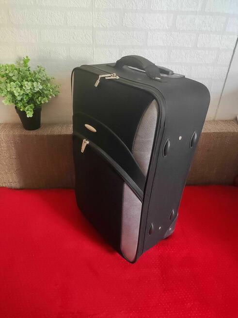 Walizka Globtroter na kółkach turystyczna podróżna Torba