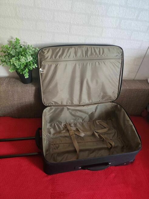 Walizka Globtroter na kółkach turystyczna podróżna Torba