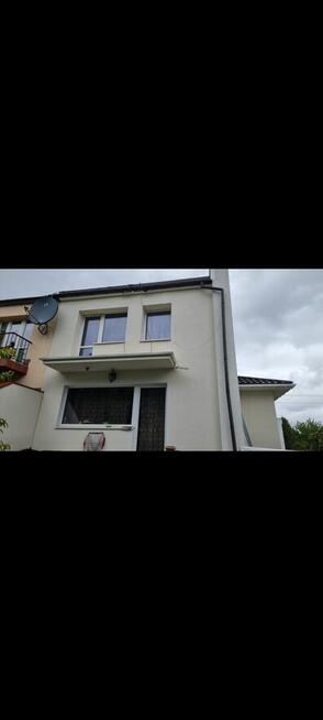 Dom bliźniak w spokojnej, cichej okolicy centrum miasta.