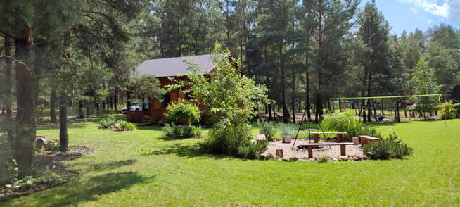 Działka z udziałem w plaży Mazury z domkiem letniskowym