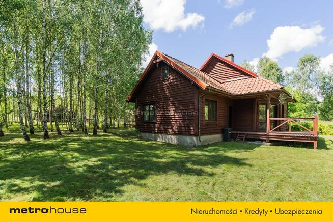 Przytulny dom w pięknej okolicy nad jeziorem.