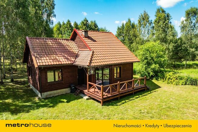 Przytulny dom w pięknej okolicy nad jeziorem.