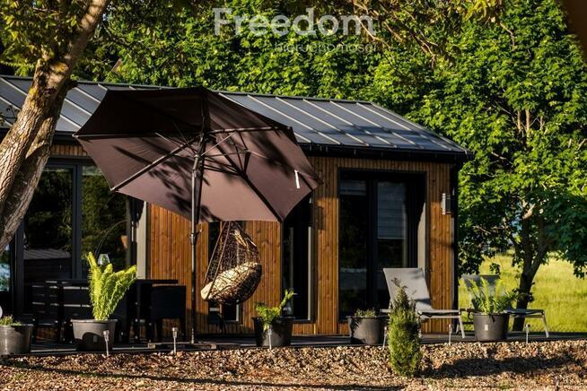 Domek w malowniczej scenerii jezior i lasów. Lutek