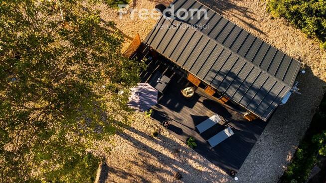 Domek w malowniczej scenerii jezior i lasów. Lutek