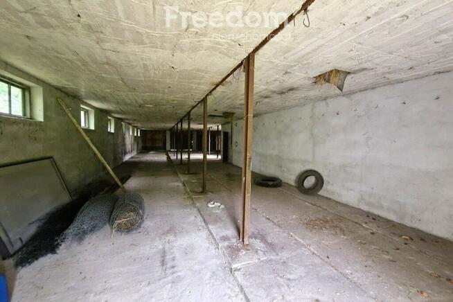Działka siedliskowa zabudowana stodołą 495 m2