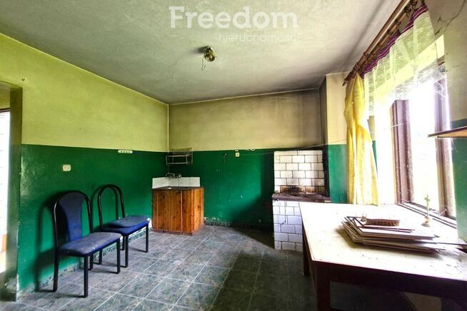 Działka siedliskowa zabudowana stodołą 495 m2