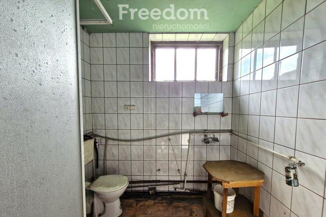 Działka siedliskowa zabudowana stodołą 495 m2