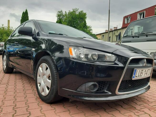 Mitsubishi Lancer Zarejestrowany i ubezpieczony w Polsce. 1.6 Benzyna + Gaz. Klima.