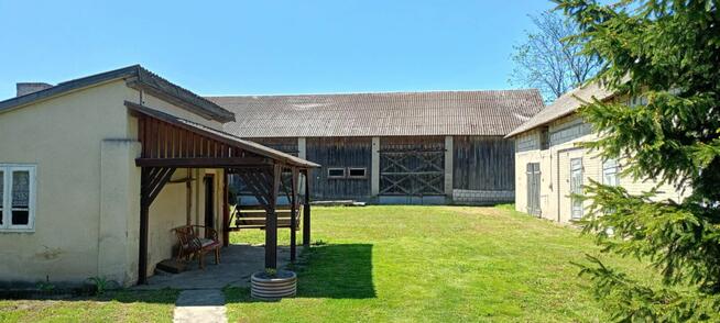 Działka z domem i budynkami gospodarczymi